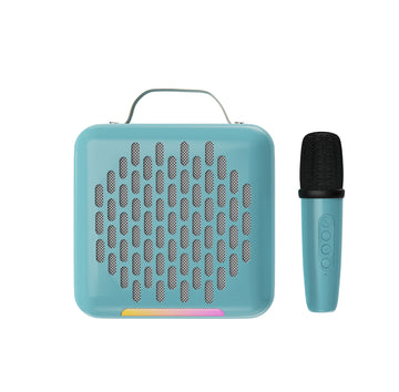 A portable blue speaker with a handle and a microphone next to it.