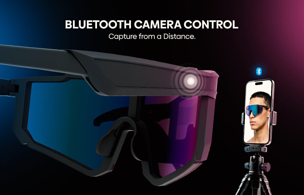 A pair of smart sport sunglasses with a module on the frame, shown alongside a smartphone on a tripod displaying a live feed of a person wearing the sunglasses. The image features the text 'BLUETOOTH CAMERA CONTROL' at the top against a dark background with blue and pink lighting.
