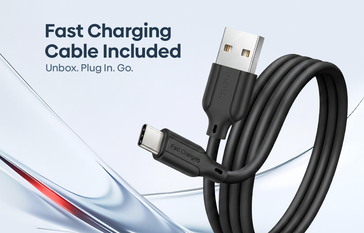 A black USB-C to USB-A charging cable coiled on a light blue and white background, with text reading 'Fast Charging Cable Included' and 'Unbox. Plug In.