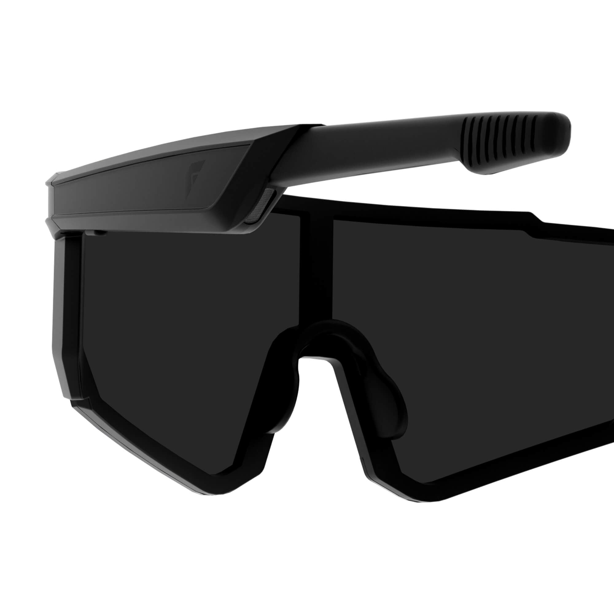 Black shield-style smart glasses with a thick protective frame and dark tinted lenses, shown on a plain white background.
