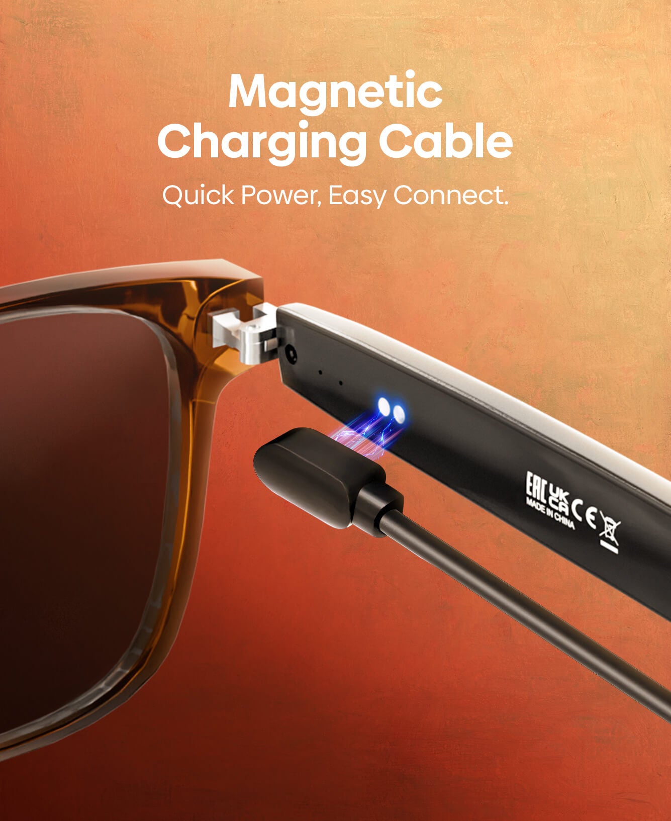 A magnetic charging cable attached to the temple of a brown acetate sunglasses frame, with text reading 'Magnetic Charging Cable' and 'Quick Power, Easy Connect.' on a warm orange gradient background.