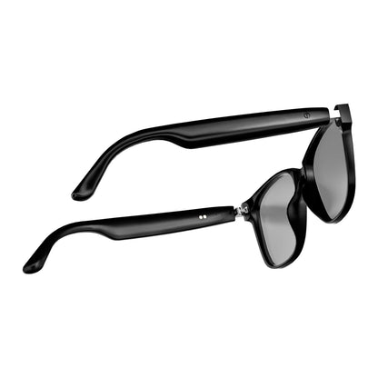 Black wrap-around sunglasses with dark tinted lenses, shown from a side angle on a plain white background.