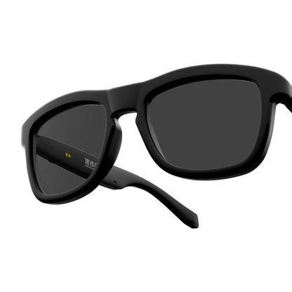 Black smart sunglasses with a matte black frame and dark lenses, shown at an angle on a plain white background.