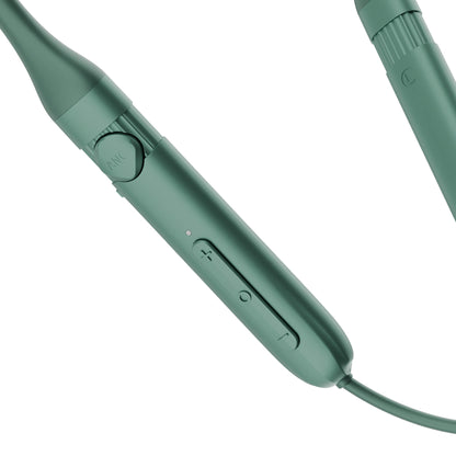 A close-up of a teal green wired electronic device, likely a neckband, showing the inline control buttons and a textured connector on a white background.